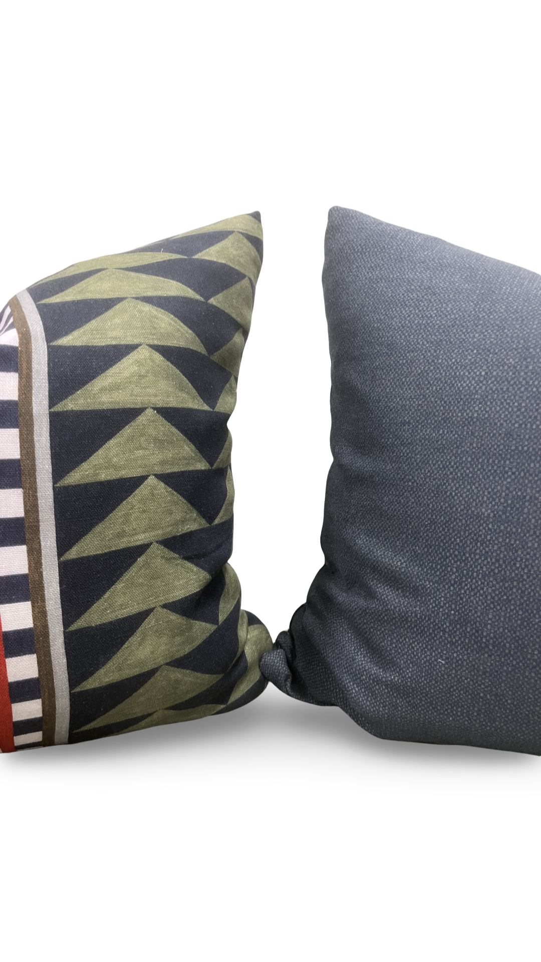 Two pillows, one with geometric pattern and the other solid color, on a white background