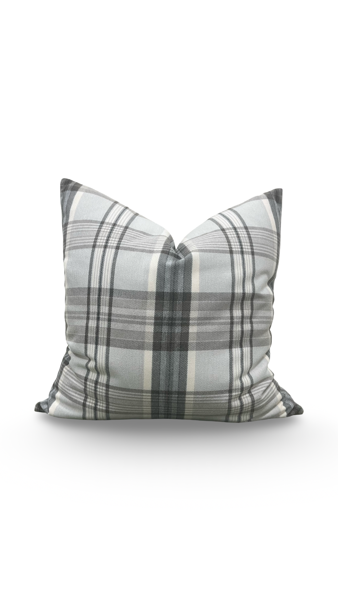 Plaid patterned pillow on a white background