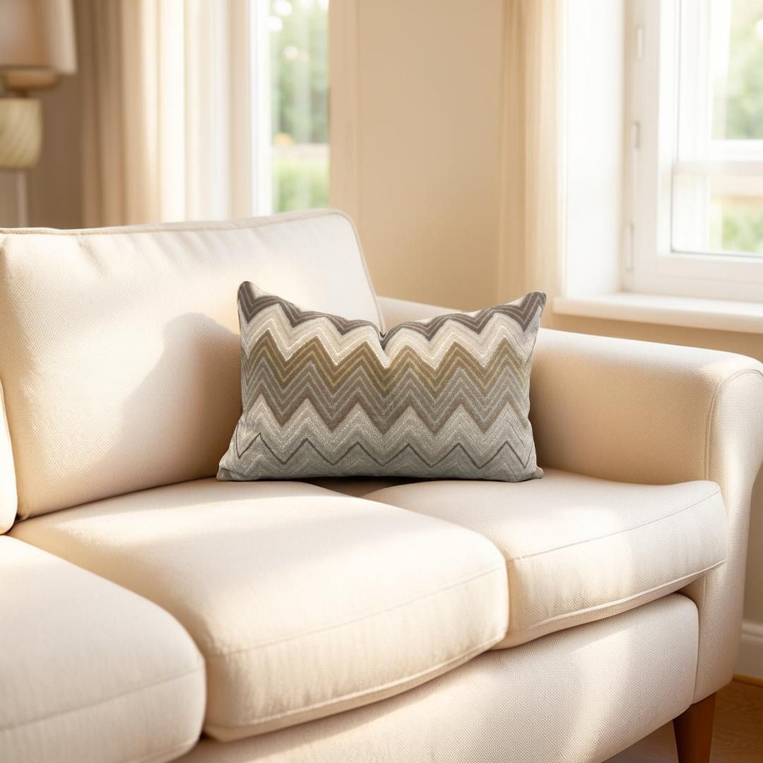 Beige sofa with a decorative pillow in a bright living room