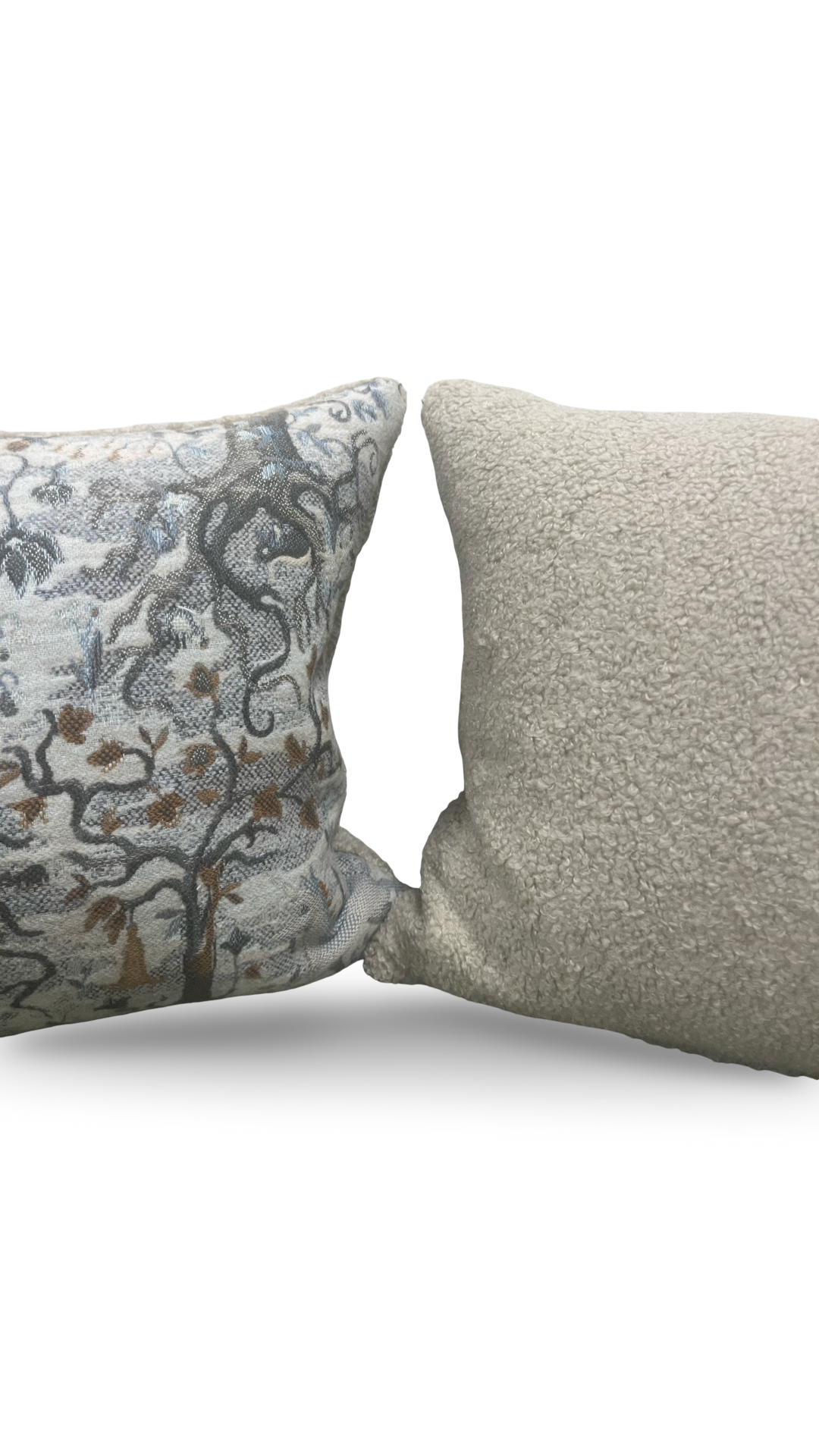 Two textured pillows on a white background