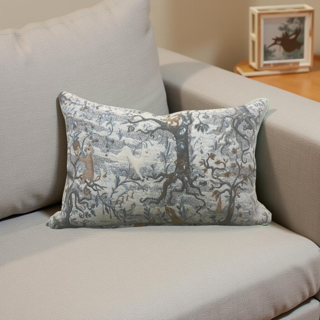 Decorative pillow with nature pattern on a beige sofa