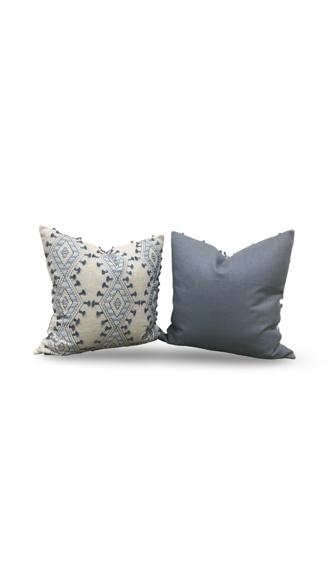 Two decorative pillows, one with a geometric pattern and the other solid color, on a white background.