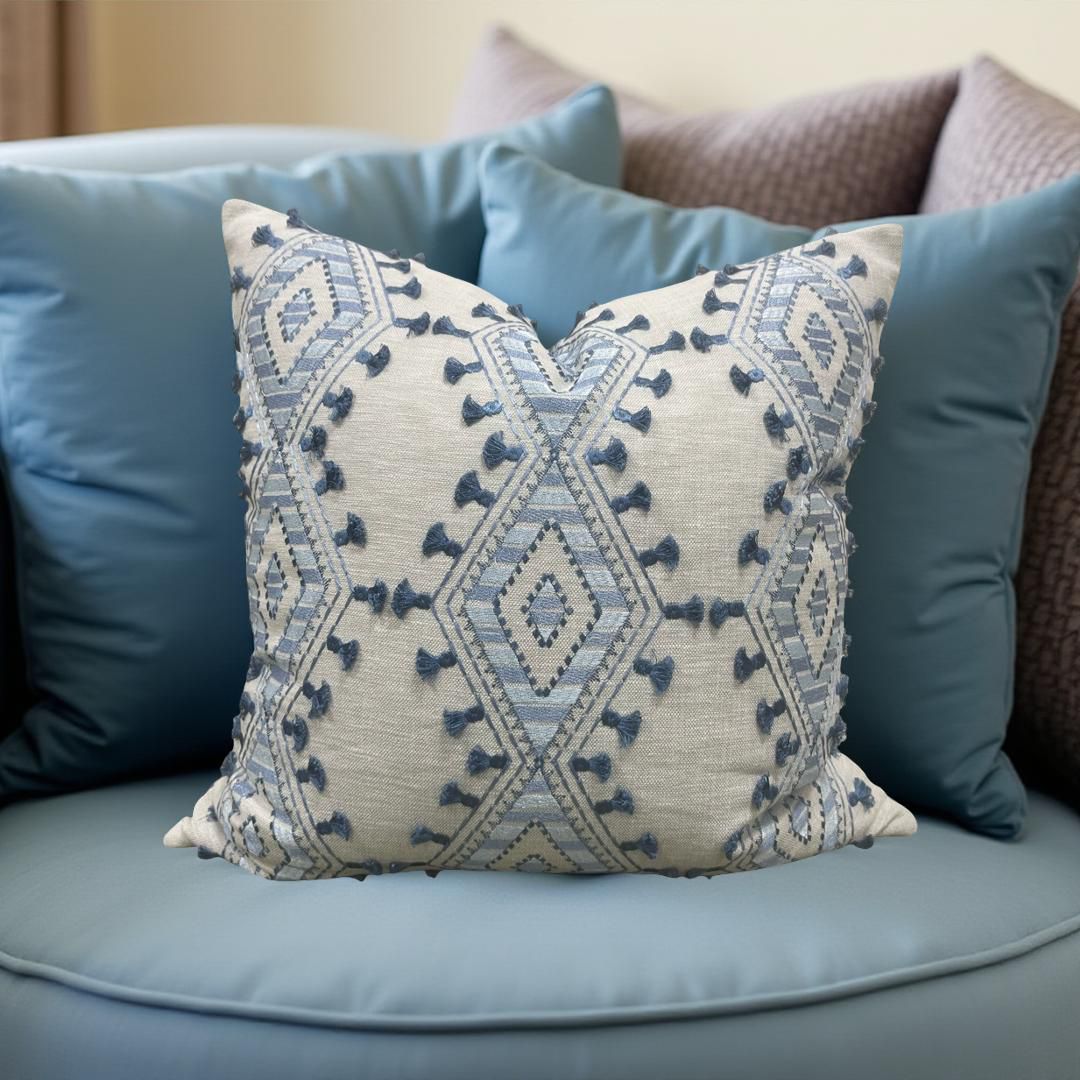 Decorative pillow with geometric pattern on a sofa