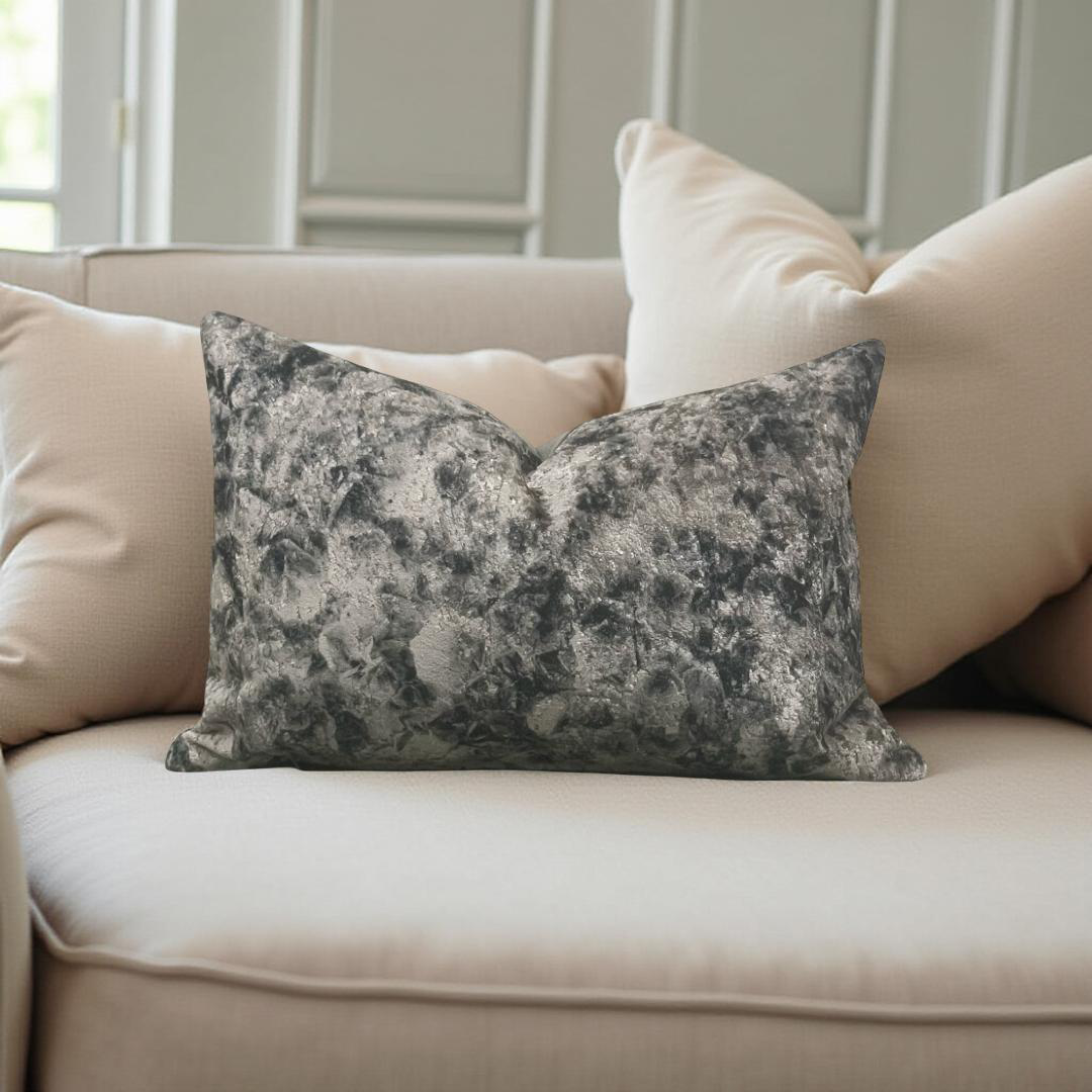 Decorative pillow with floral pattern on a beige sofa