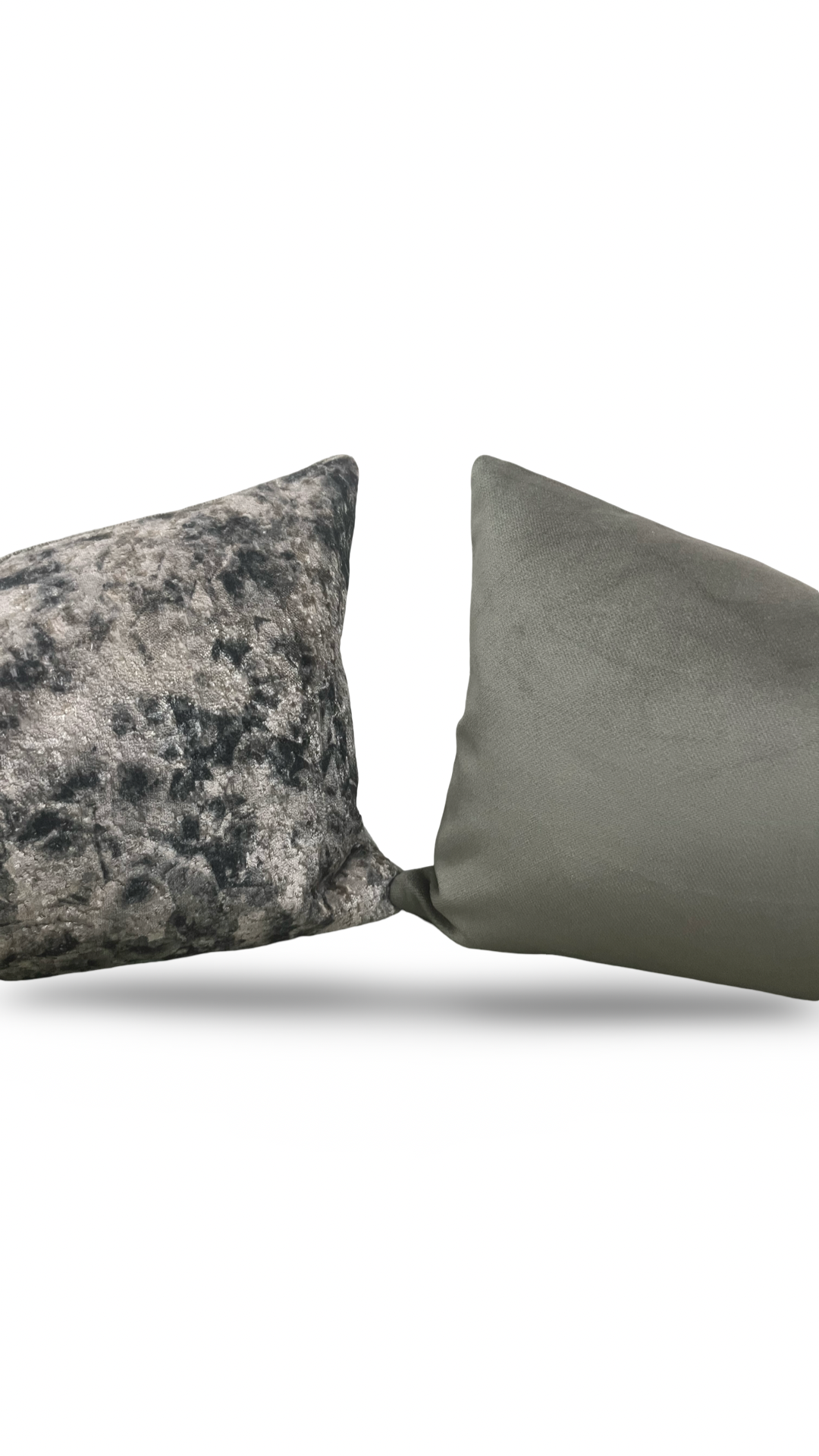Two textured pillows, one gray and one green, on a white background