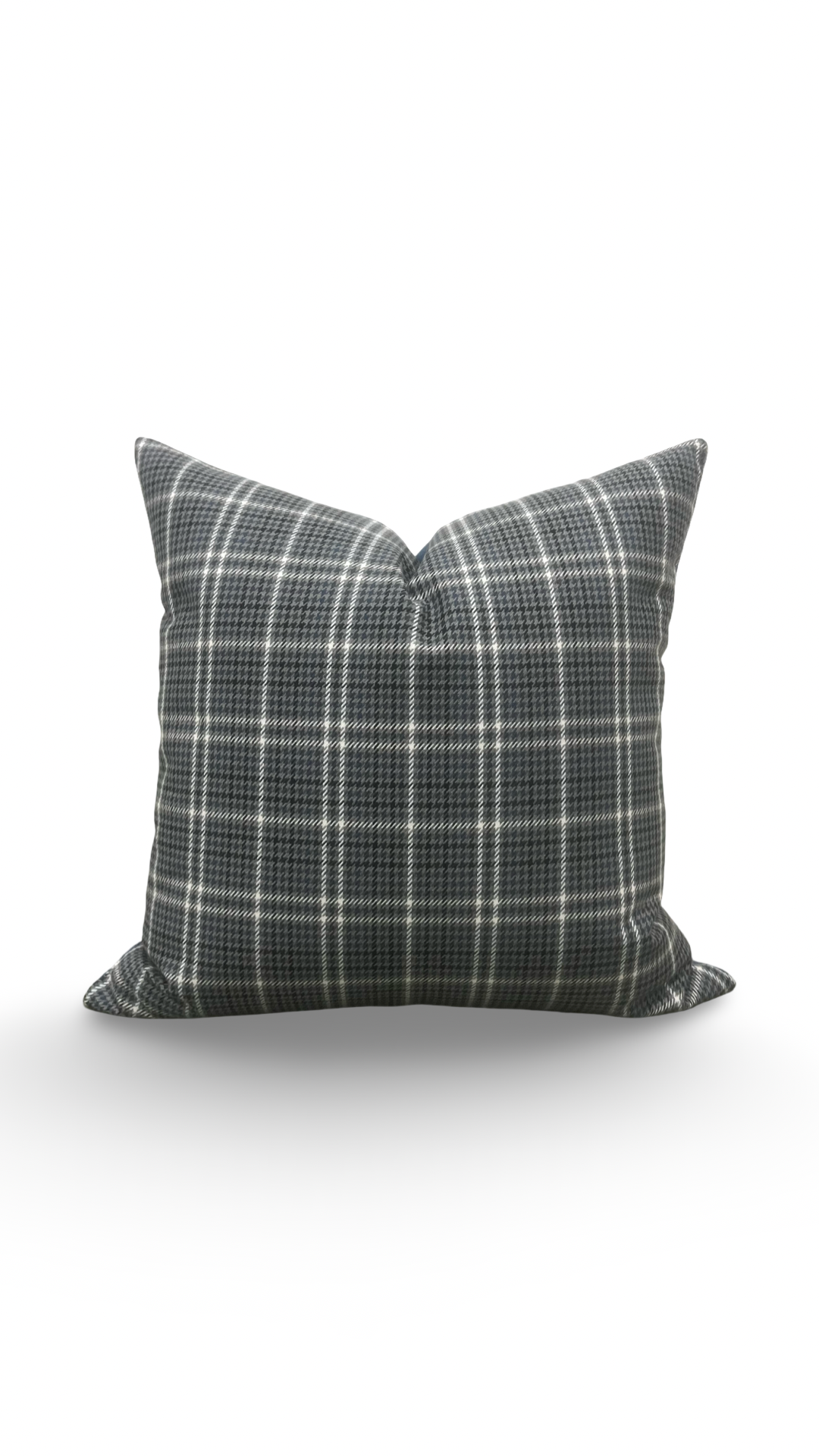 Plaid patterned pillow on a white background
