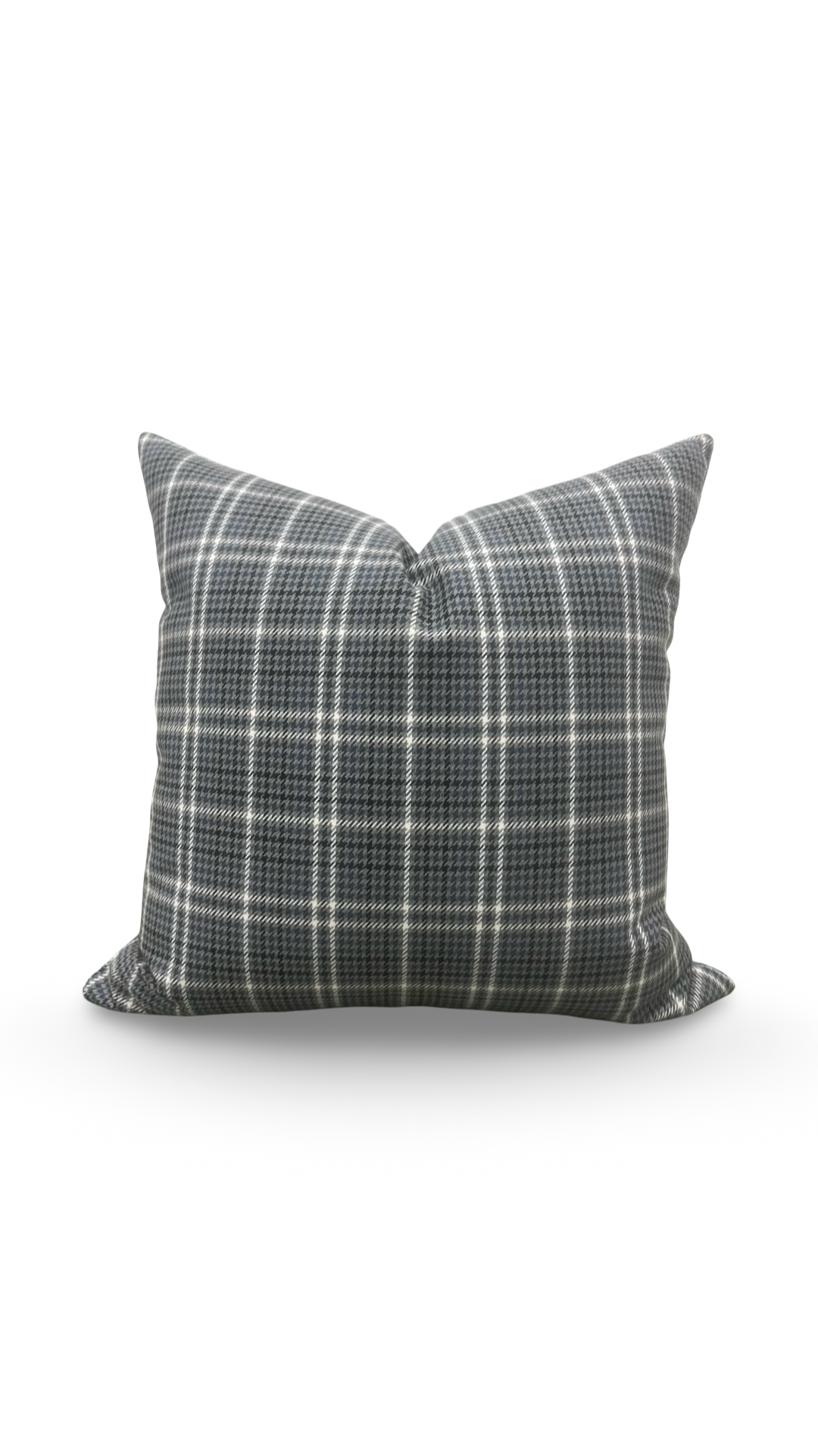 Plaid patterned pillow on a white background