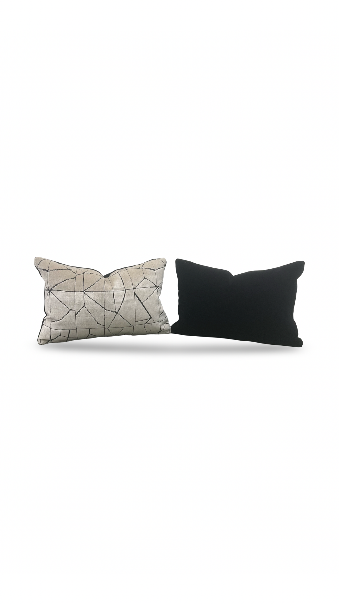 Two decorative pillows, one with a geometric pattern and the other black, on a white background.
