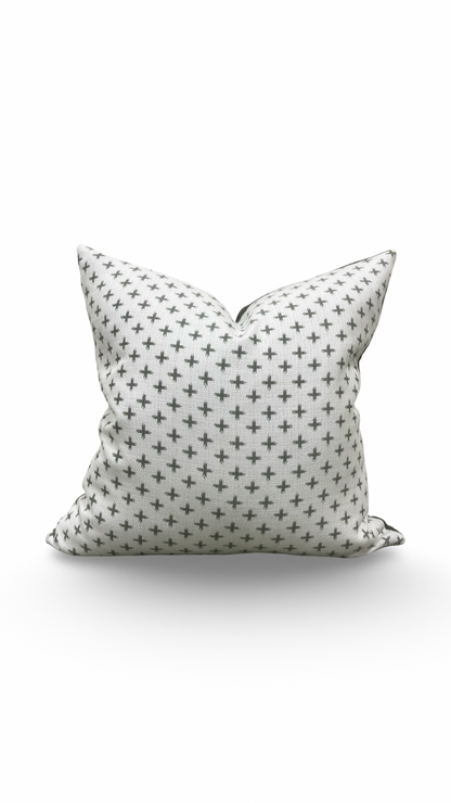 Decorative pillow with star pattern on a white background
