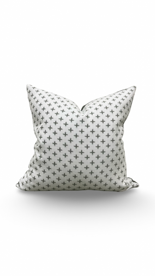 Decorative pillow with star pattern on a white background