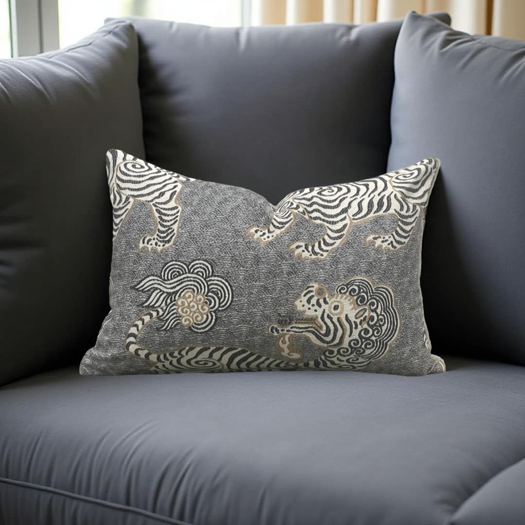 Decorative pillow with zebra pattern on a gray sofa