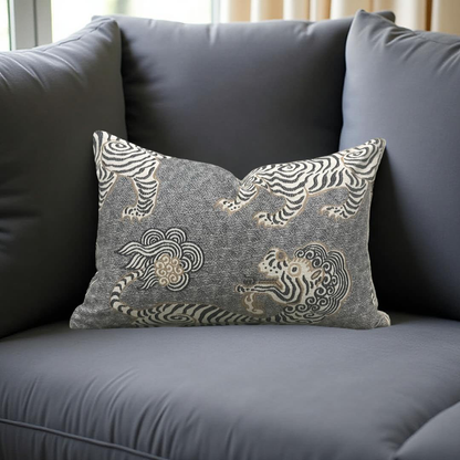 Decorative pillow with zebra pattern on a gray sofa