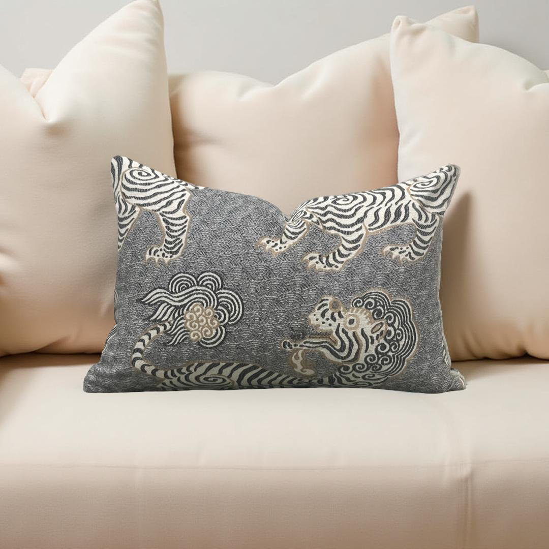 Decorative pillow with zebra design on a beige sofa