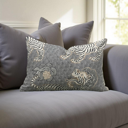 Decorative pillow with zebra pattern on a gray sofa