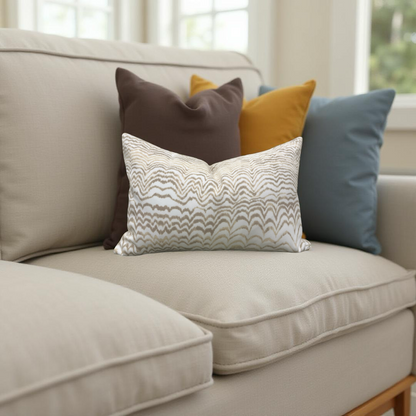 Beige sofa with colorful pillows in a bright room